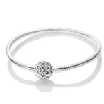 Ženska narukvica od srebra sa kopčom pahuljica