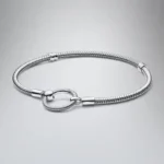 Ženska narukvica od srebra sa okruglom kopčom na preklop