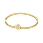 Ženska narukvica od srebra u gold boji sa pozlatom, sa kopčom u obliku krunice