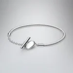 Ženska narukvica od srebra sa kopčom probušeno srce