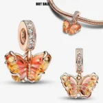 Privjesak za narukvicu, rose gold viseći u obliku leptira sa narandžastim detaljima